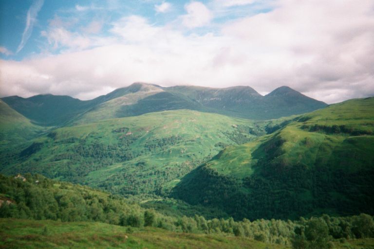 
Okay, so I know it's lots of mountain shots that start to all look the same,
but after hiking in the AT and spending time in cities and stuff, it was
just amazingly beautiful.  Plus, I wasn't about to run out of film, since
I'd just picked up some more.  
